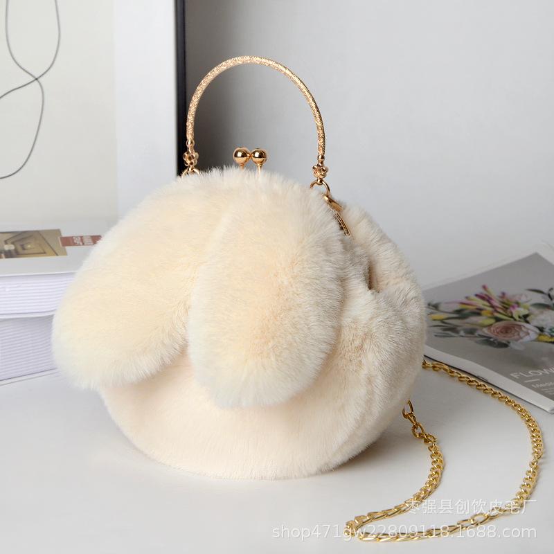 Plush rabbit bag female oblique cross Korean version cute portable fluffy bag autumn and winter new rabbit ear clip bag clip bag