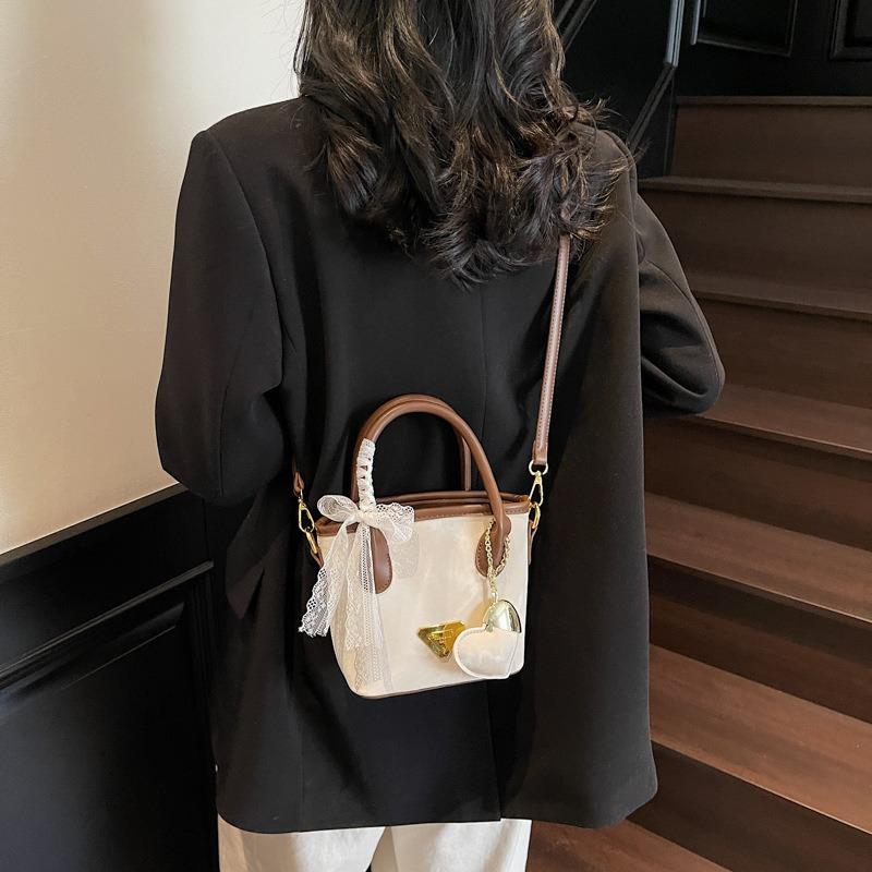 Nuova piccola borsa estiva da donna alla moda a tracolla messenger borsa a secchiello portatile popolare ora