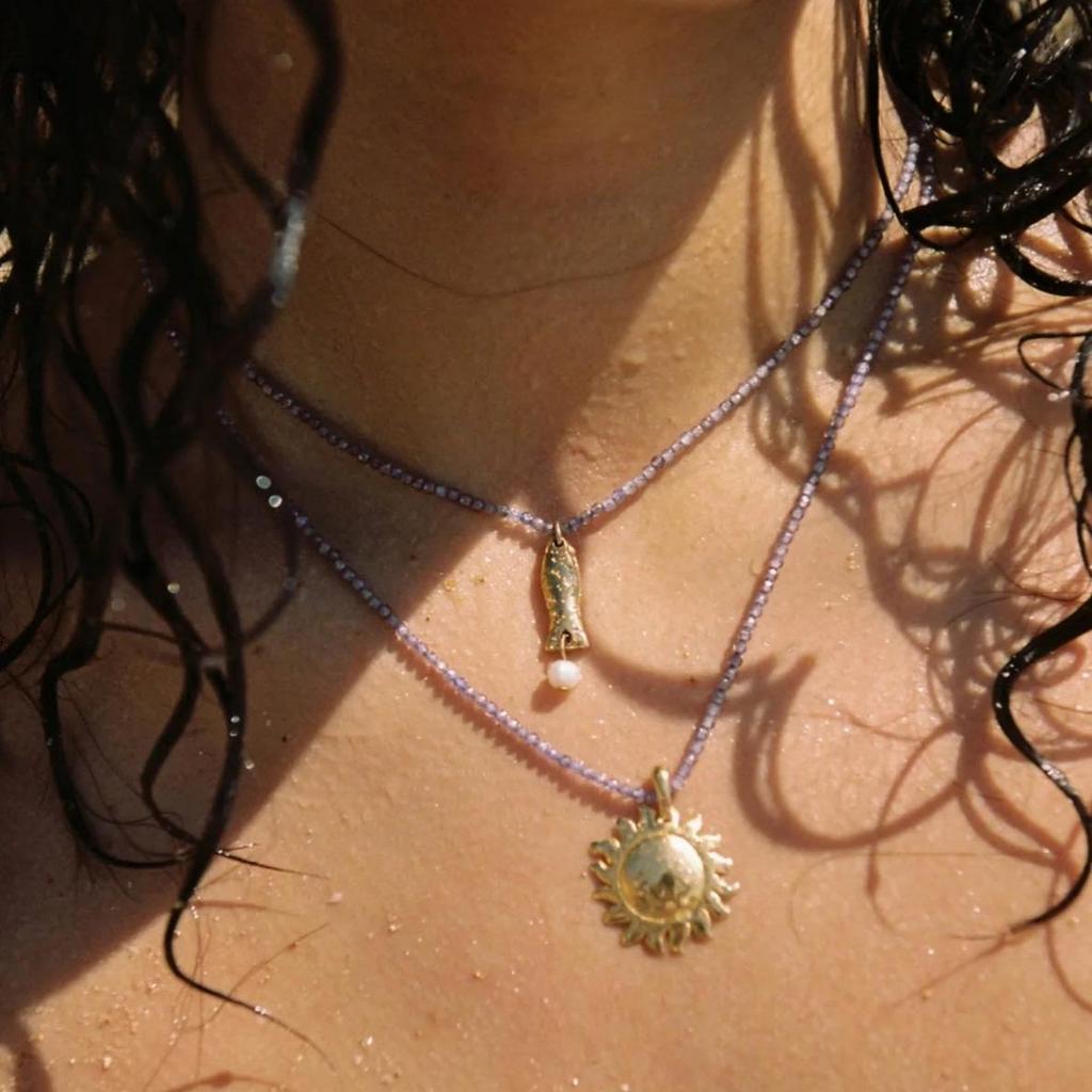 European-American 18K Gold-Plated Stainless Steel Necklace with Fish, Starfish, and Seashell Beads.