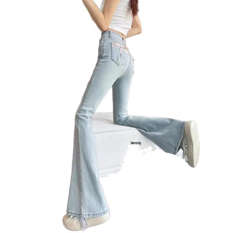 2026 Women's High Waist Butterfly Knot Micro Flare Jeans: American Style Slimming Horseshoe Pants for Spring & Autumn.