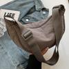 Large capacity niche casual nylon dumpling bag for men and women, student shoulder bag, new women's bag