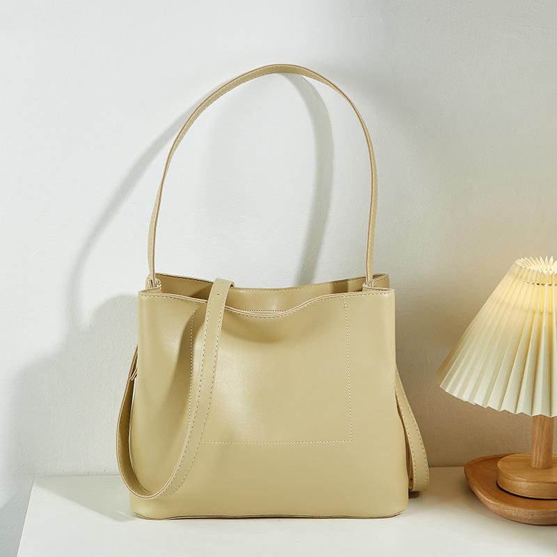 

New women s bags, women s retro handbags, simple and large-capacity tote shoulder bags, versatile messenger bags, and trendy bags. абрикосовый