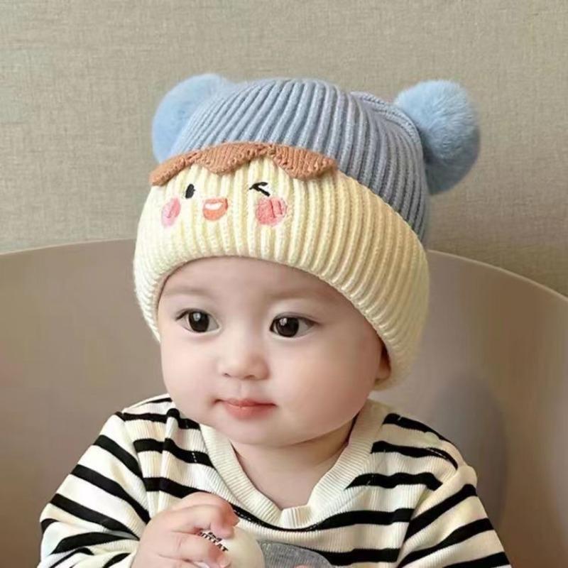 Baby autumn and winter cute cartoon warm hairball wool hat boys and girls baby ear protection hat children pullover knitted hat