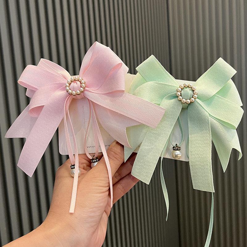 

Large Bow Hair Clip with Pink Pearl Flower for Girls Performance Headwear