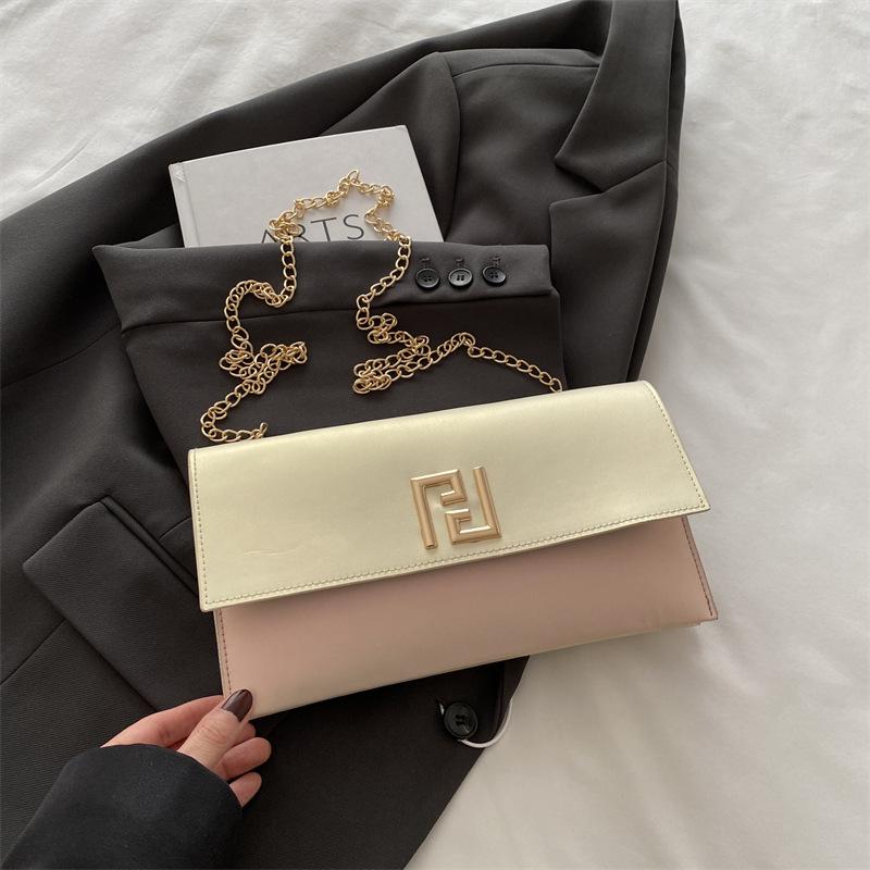 

Цього року популярна жіноча сумка у стилі ретро класу люкс 2025 нова нішева легка розкішна сумка-багет під пахву сумка через плече сумка-месенджер тренд білий