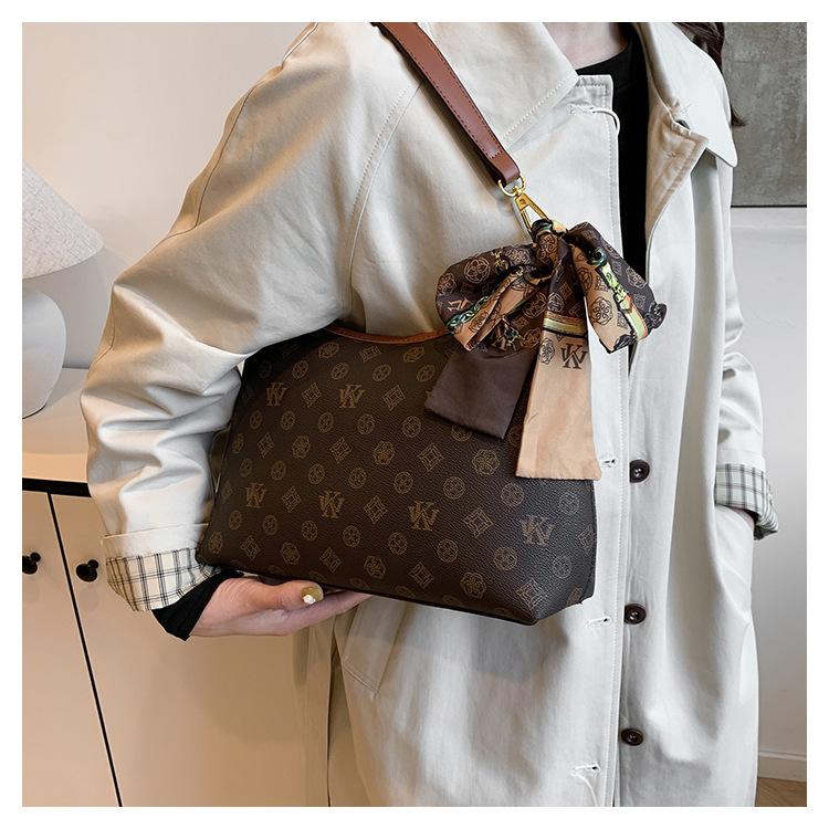 Premium väska dam 2024 ny trendig mode retro tryckt tygväska stor kapacitet mångsidig axel messenger väska