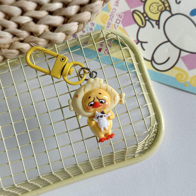 Kawaii Upsetduck Yellow Duck Resin Doll Keychain Pendant Keyring For Girls Backpack Charm Headphone Case Accessories Couple Gift