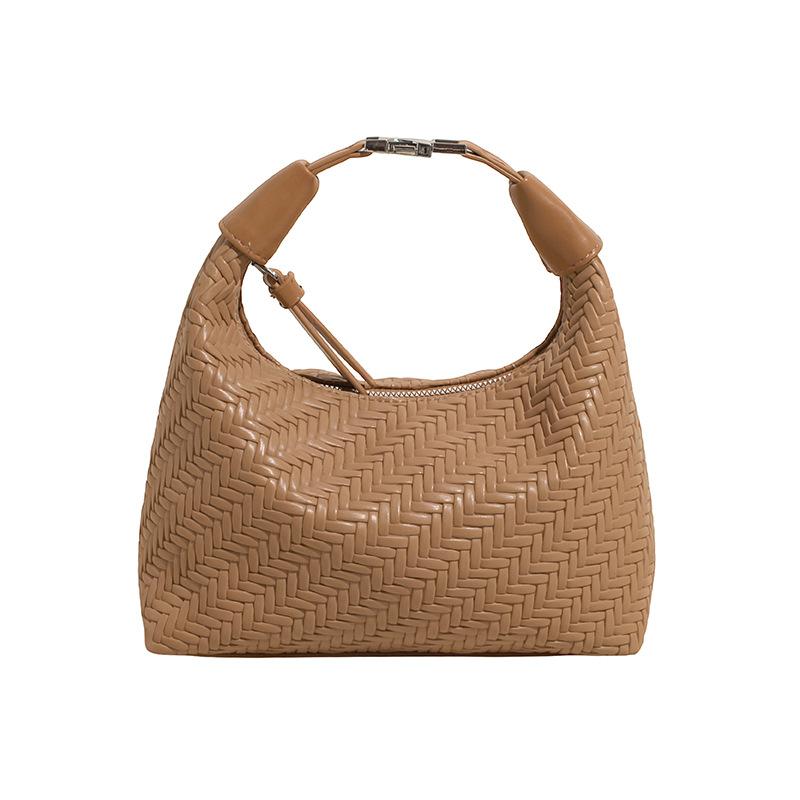 French Niche Woven Pattern Handbag Women's 2025 Spring and Summer Simple and Elegant Dumpling Bag Commuter Texture Messenger Bag