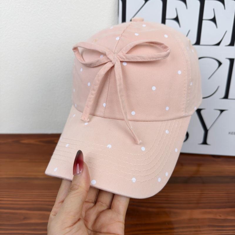 Korean black and white polka dot bow baseball cap female versatile sweet cute niche design show face small cap