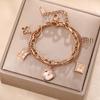 Colorfast Korean-Japanese Titanium Steel Women's Bracelet - Versatile, Fashionable Hand Jewelry.