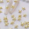 Goldene Seestern-Nagelanhänger Meeresstil Glitzernde Strasssteine Stern-Nagelkunst-Dekorationen Frühling Sommer 10 Stück 3D-Legierung DIY-Nagelsteine Geschenk für Mädchen