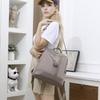 Neue Große Kapazität Einfachen Stil Casual Mochila Reise Frauen Design Quaste Rucksack Wasserdichte Stoff Große Weibliche Schulter Tasche