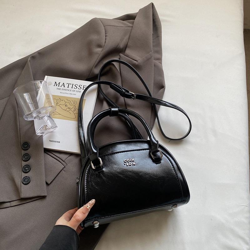 

High-end small bag women s new spring and summer versatile messenger bag portable bowling bag