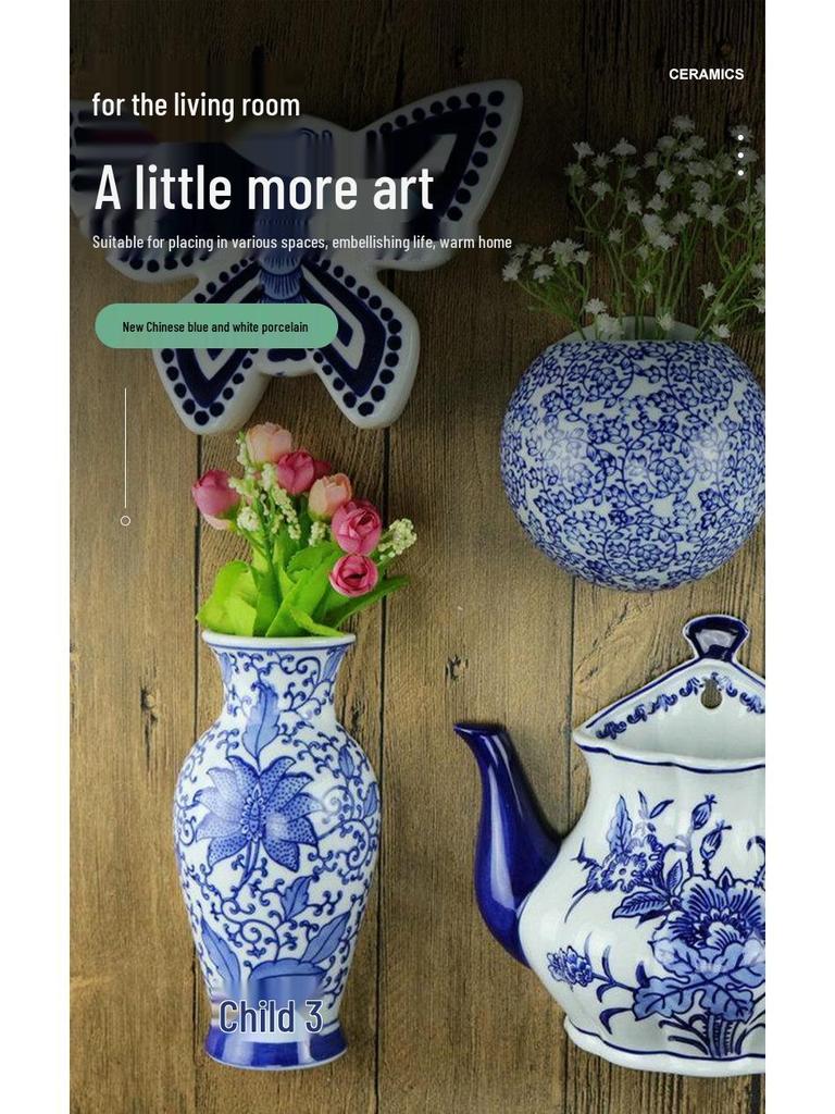 Hand-Painted Blue and White Ceramic Wall Vase with Floral and Bird Design