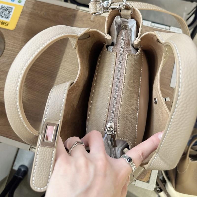 New Leather Women's Bag First Layer Cowhide Li Pattern Leather High-end Feeling Hand Carrying Bucket Bag Women's Lychee Pattern Basket Bag