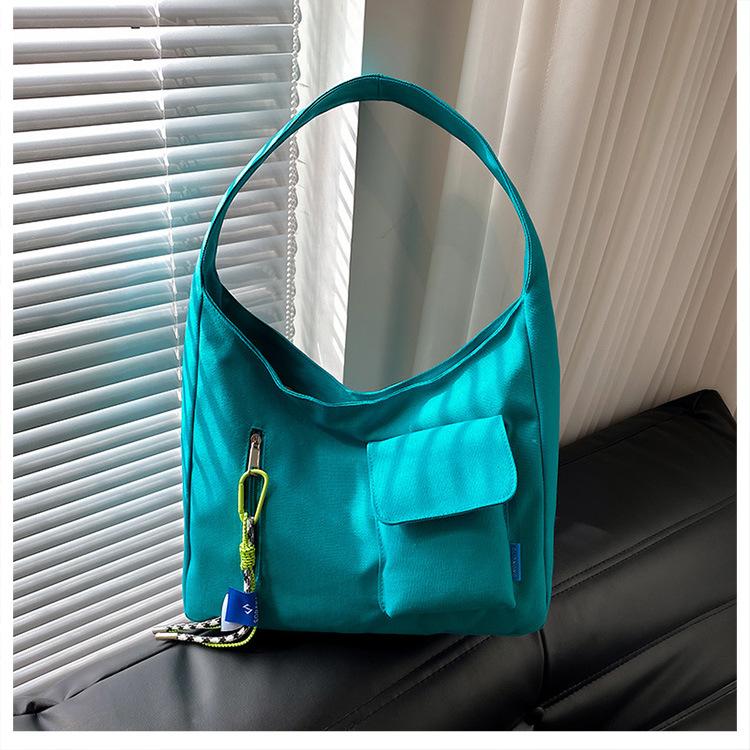 

2025 autumn and winter new fashionable versatile girl shoulder bag large capacity student make-up bag canvas bag синий