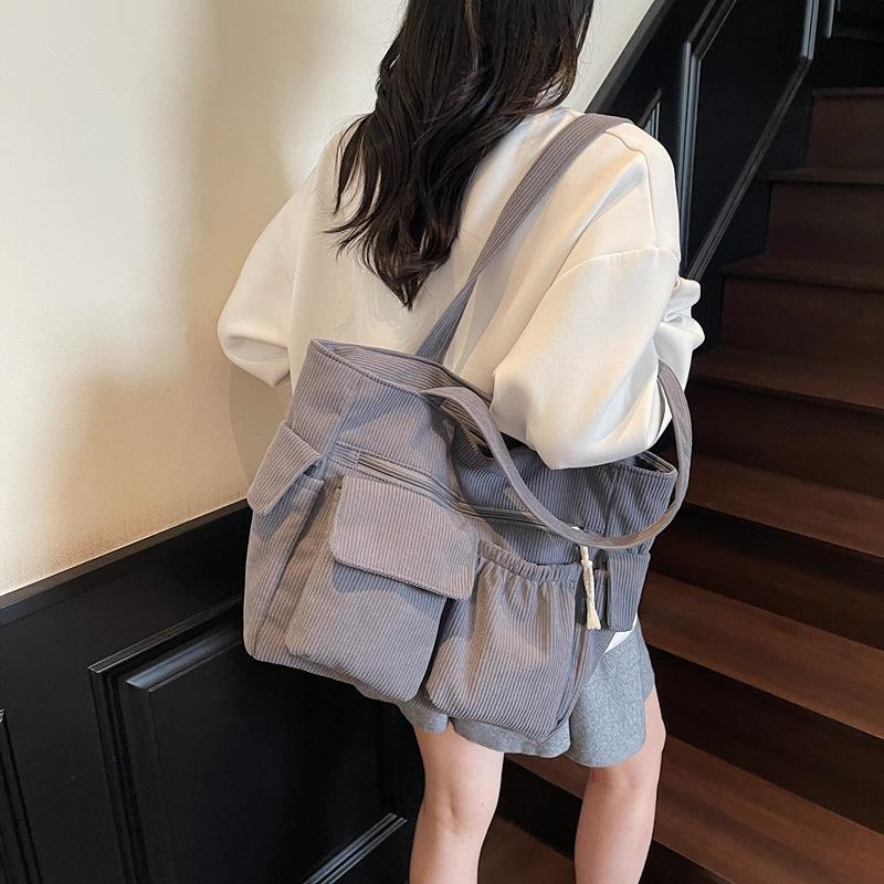 

2025 new large-capacity tote bag corduroy portable messenger bag casual and lightweight student versatile tutoring bag single package серый