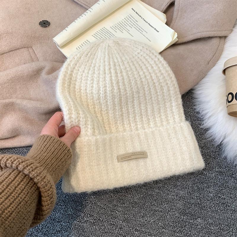 Gray knitted wool hat women's winter versatile warm pile hat showing face small cold hat ear protector bag head hat