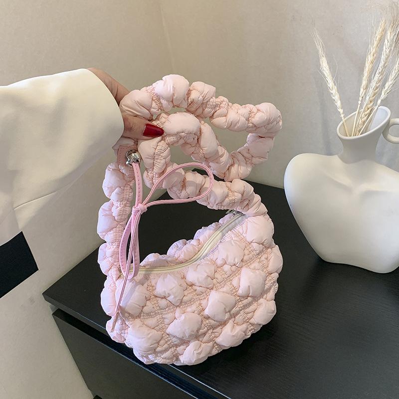 

2024 summer new Korean version niche design cloud pleated armpit bag fashionable and casual simple shoulder messenger bag рожевий