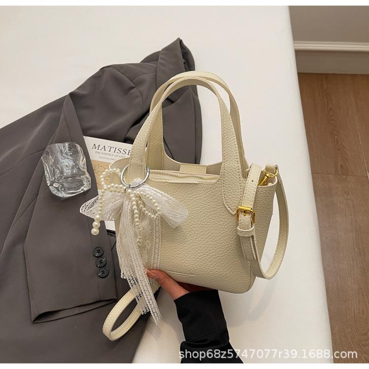 Summer Super Hot Bag Women 2025 New Fashion Versatile Messenger Bag Popular High-end Niche Portable Bucket Bag