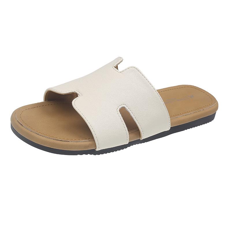 

Крутые тапочки женские летние для улицы 2025 новые на толстой подошве повседневные нескользящие пляжные сандалии ленивая мода тапочки на одном ремешке 35