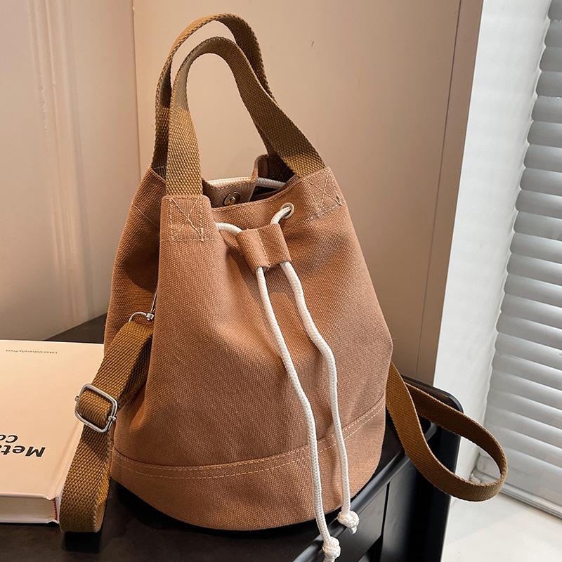 

Корейская версия простой холщовой сумки для женщин, модная повседневная ручная сумка-ведро для студентов, универсальная сумка через плечо на одно плечо