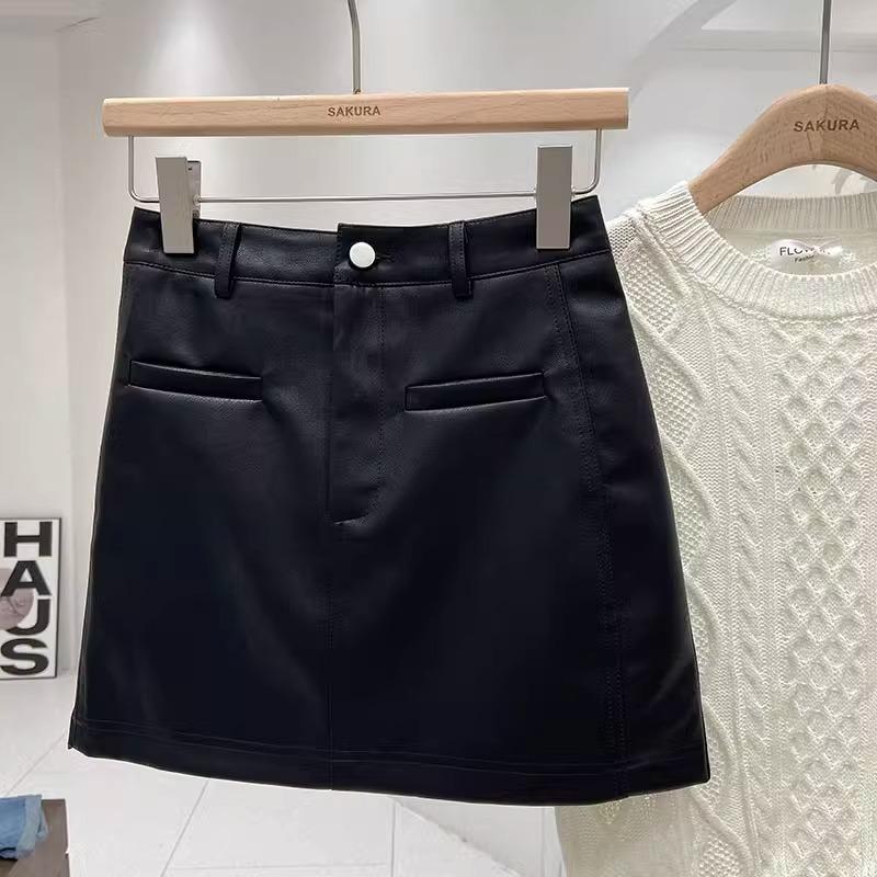 High-Waisted PU Leather A-Line Skirt - Korean Style, Single Button, Versatile Commuter 2024 Autumn/Winter Women's Short Skirt.
