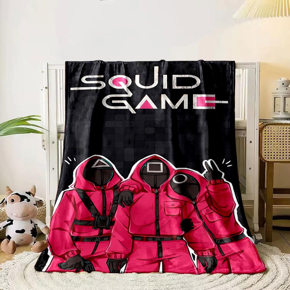 Red hooded figures with geometric masks on a dark tiled background. for all seasons blanket lunch break throw gift