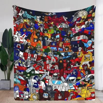 Transformers Colorful Cartoon Blanket - Densely Packed Illustration of Iconic Characters Like Optimus Prime and Bumblebee In Bol