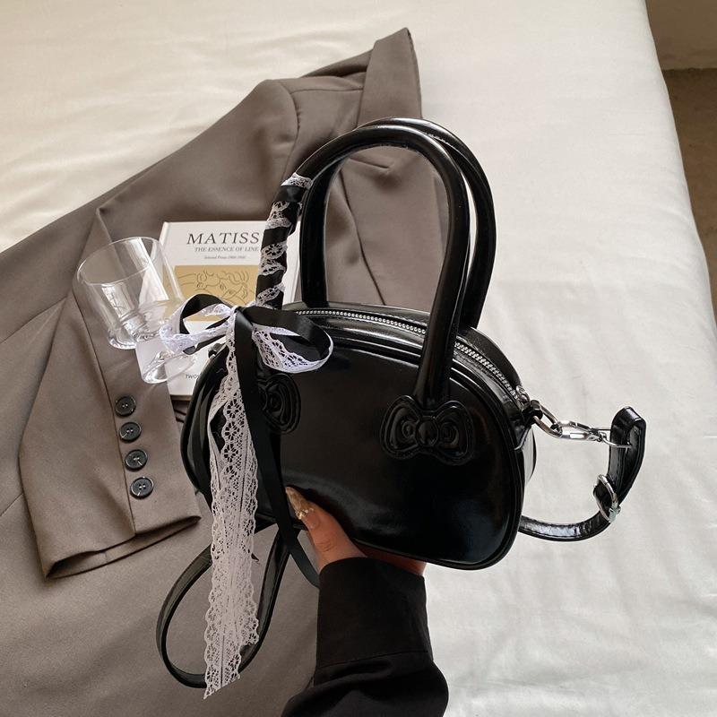 Spring and summer hand carry bow pillow bag women's new simple and fashionable shoulder bag high-end messenger bag