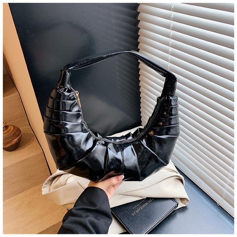 

Spring fashion casual premium texture design pleated dumpling handbag temperament shoulder armpit bag чорний