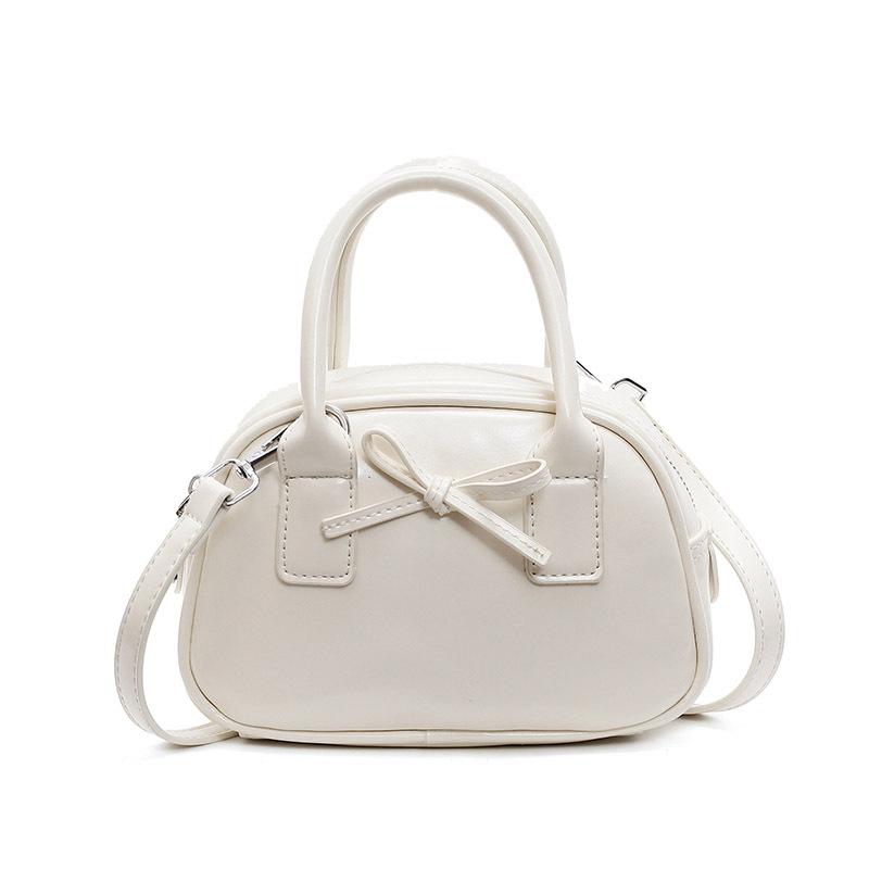 Hot Sale Premium Textured Oil Wax Leather Hand Carry Bowling Bag Niche Fashion Bow Versatile Messenger Women's Bag