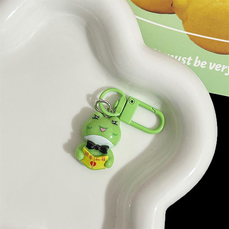 

Mini Lonely Frog Keychain Off Single Cheats Funny Cartoon Pendant Girlfriend Gift Trumpet Ornament Green-A3