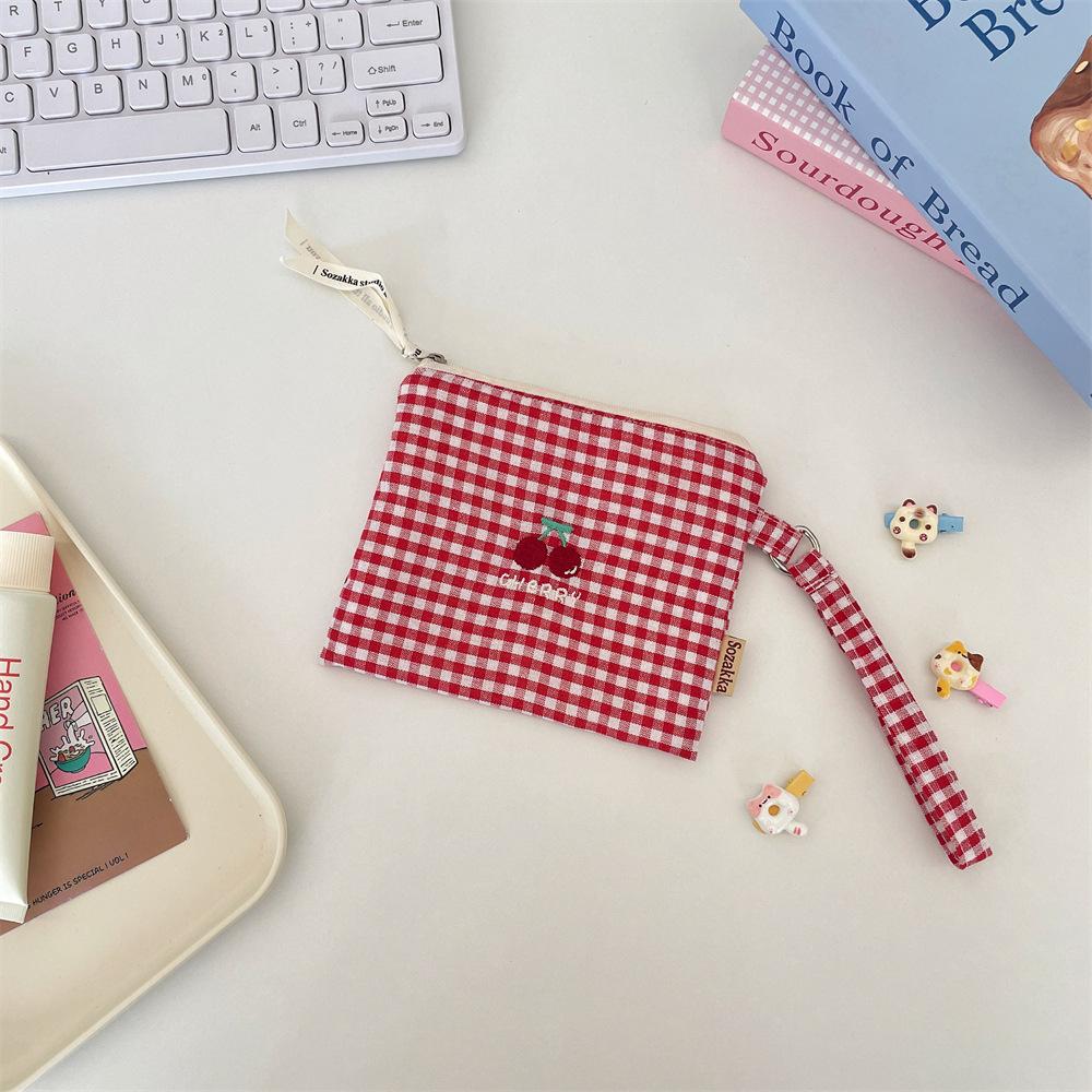 5 Cute embroidery storage bag, change bag, portable earphones, sundries, sorting bag, lipstick jewelry, coin storage.