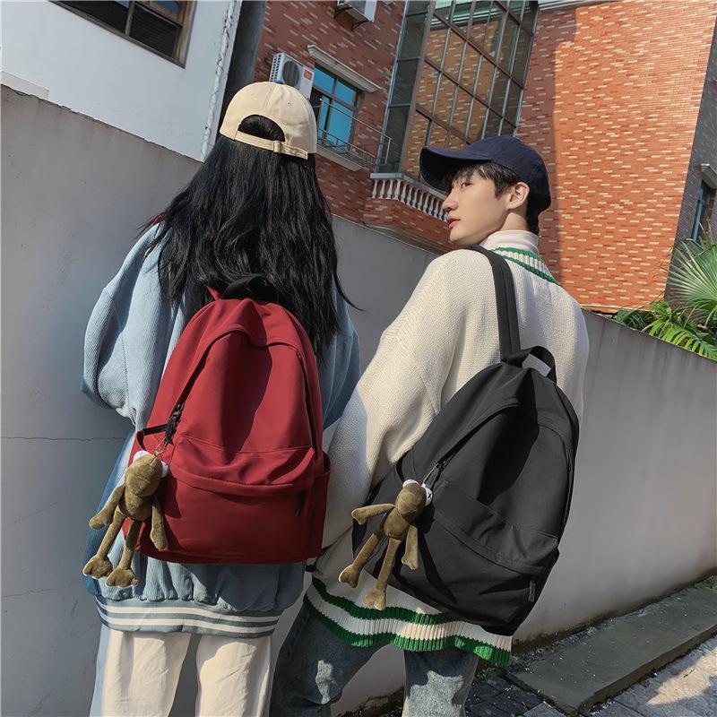 Solid color simple version of literary and artistic student schoolbag Korean version of casual style large-capacity backpack