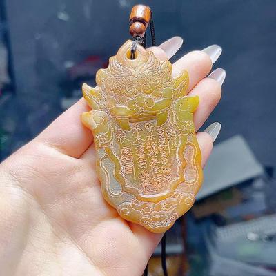 Xiuyan Jade Antique Pendant: Ancient Jade Handle and Mountain Ghost Design.