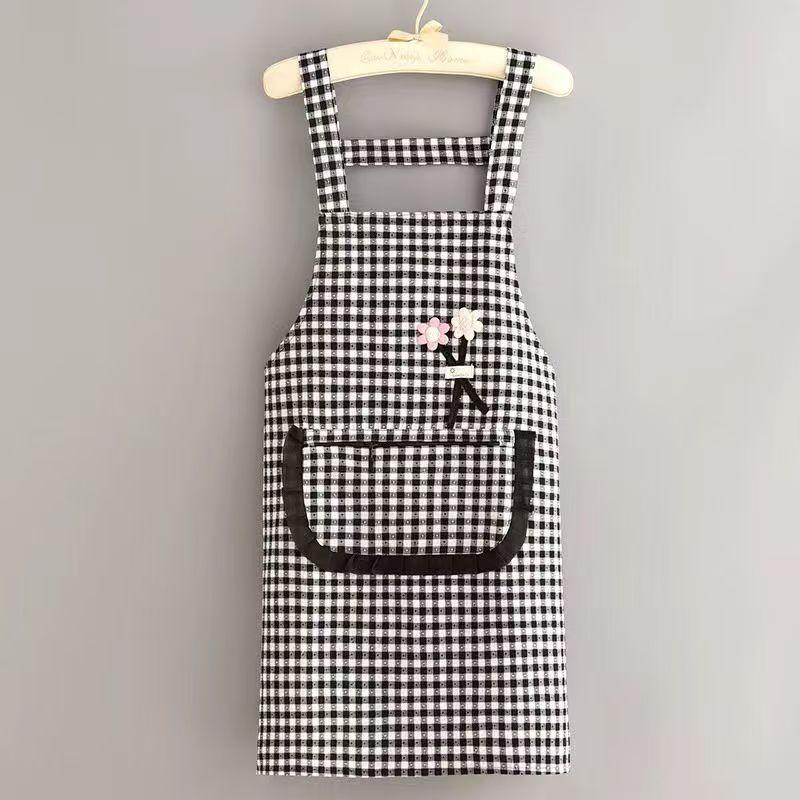 Black And White Checkered Apron With Cute Flower Decorations And Large Pockets.