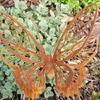 Butterfly Form Metal Piece with Shared Iron Build, Aged Finish, and Wing Line Detail for Garden Display Shared Use
