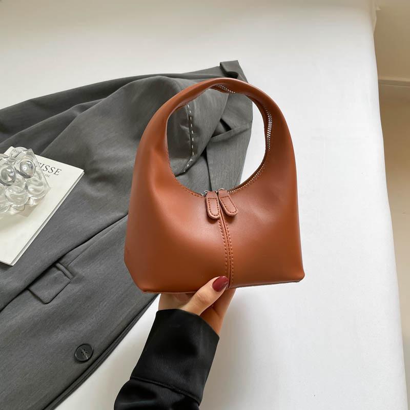 New Women's 2025 Niche Bag Solid Color Design High Sense Elegant Fresh Fashion Retro Versatile Handbag