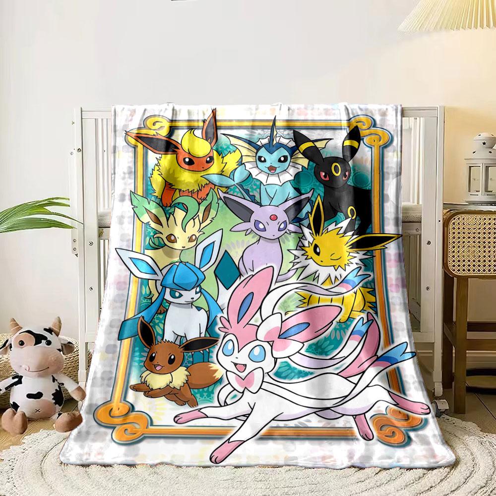 

The image displays Eevee and its evolutions grouped in a framed design. for all seasons blanket lunch break throw gift 80cm x 120cm