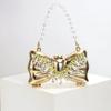 Luxury Fashion Metal Mini Handbag With Bow Clasp Playful Acrylic Bow Design With Shimmering European-Style Chain Crossbody Bag