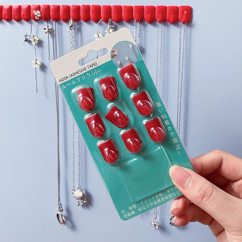 

No-drill mini hook with strong adhesive for hanging keys and decorations Red