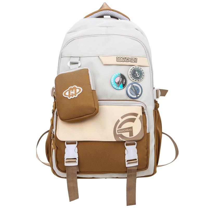 Stylish and Exquisite Contrasting Color Badge Large-capacity Backpack 24 New Primary School Junior High School Boys and Girls Schoolbag