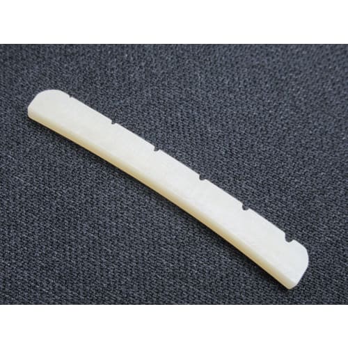Unbleached, general-purpose grooved shaped bone nut (43mm wide) with a curved bottom for Fender guitars