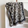 Middle East new camellia jacquard imitation cashmere scarf women's short tassel high-end black shawl