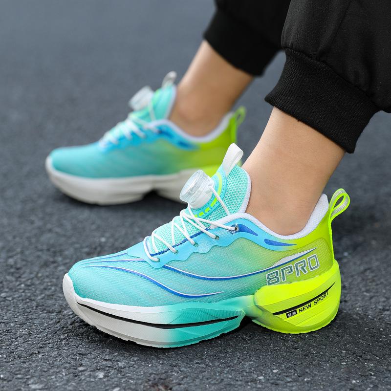 2025 new running shoes boys primary and secondary school students non-slip rotating buttons teenagers summer breathable running shoes wear-resistant