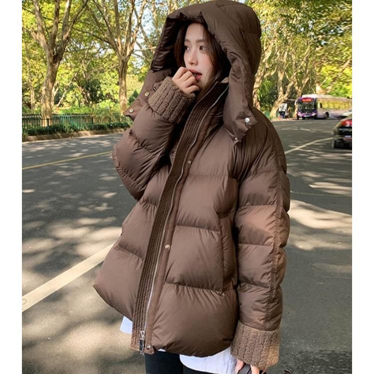 Žieminė storesnė moteriška striukė su oversized avikailio apykakle