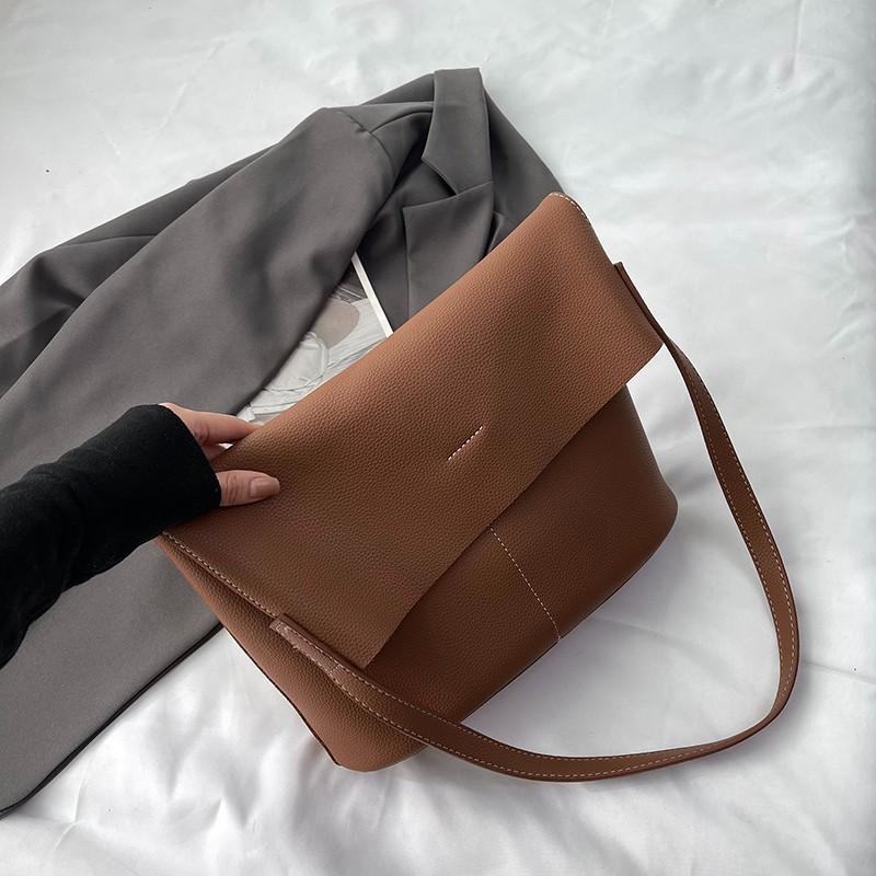 Large capacity monochromatic PU shoulder bag for women simple and versatile classic commuting style casual
