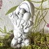 Decorative sculpture gray concrete dwarf figure