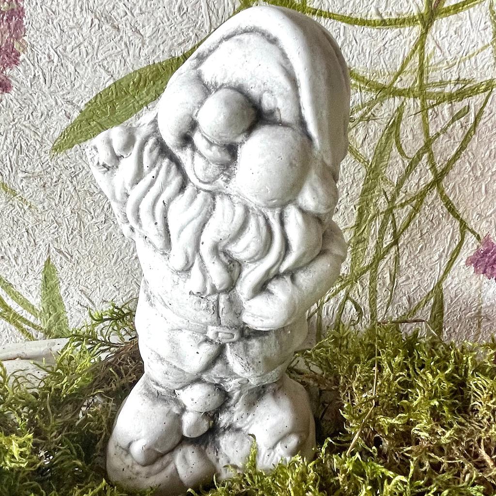 Decorative sculpture gray concrete dwarf figure